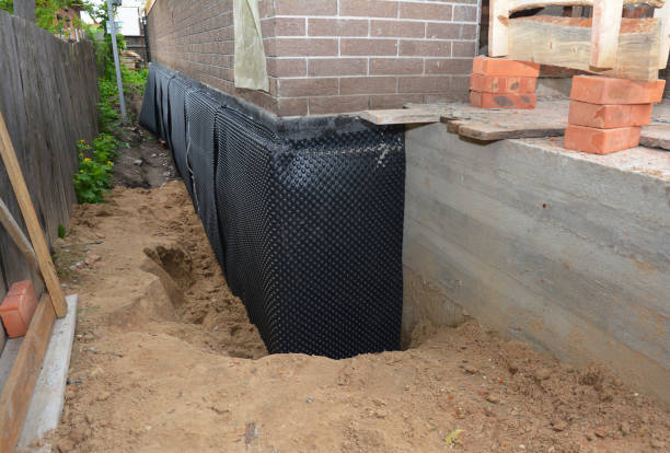 SJ Waterproofing Pros technician performing targeted Sump Pump Installation assessment in Collegedale, TN